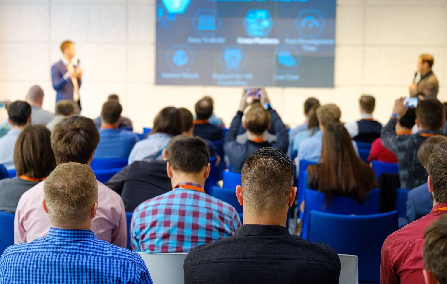 Audience Listening To The Presenter In A Conference Room