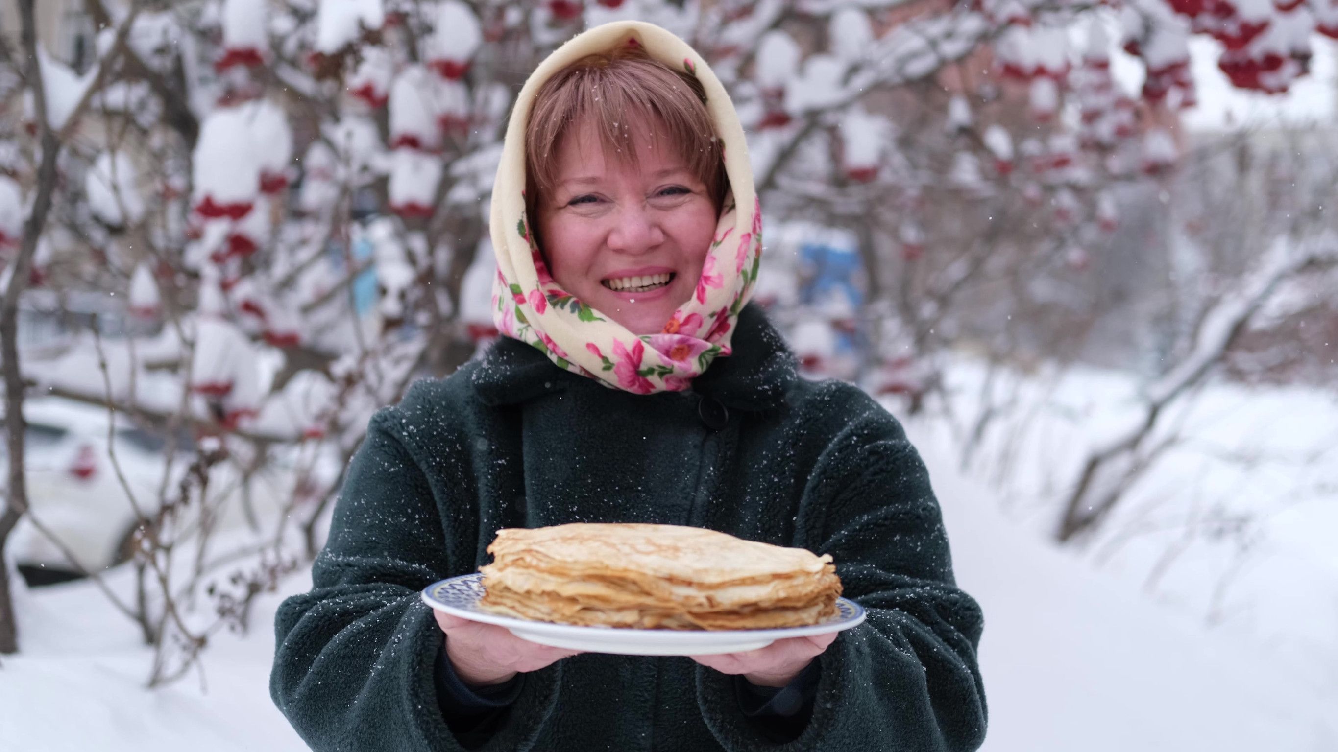 Baking traditional pancakes for Maslenitsa in Russia