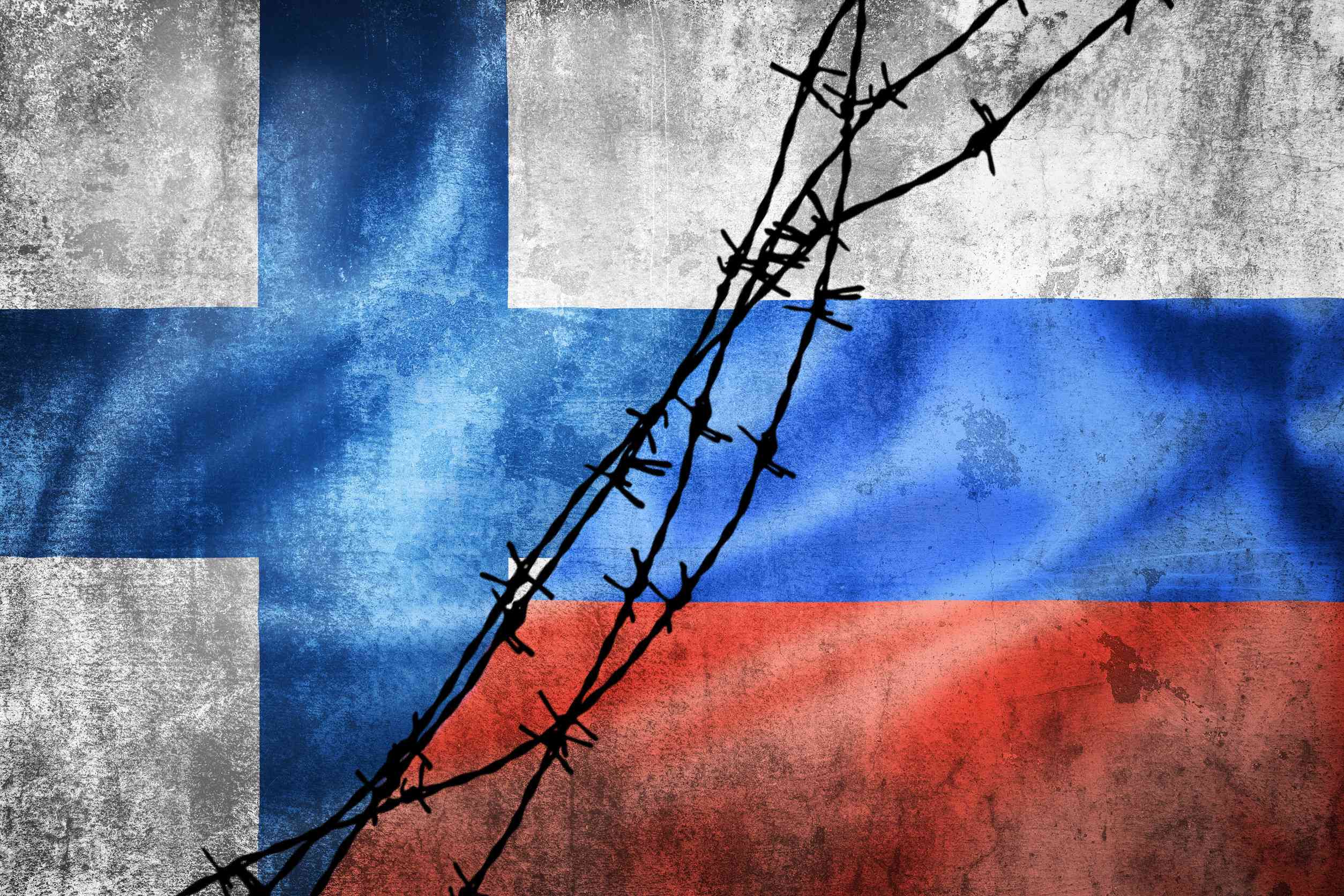 Grunge flags of Russia and Finland divided