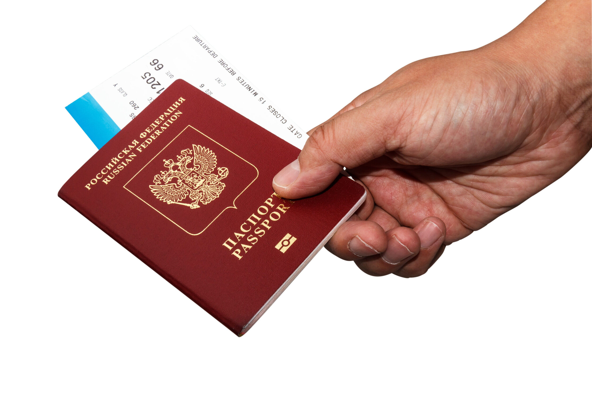 Russian Man holding a Russian Passport with a ticket