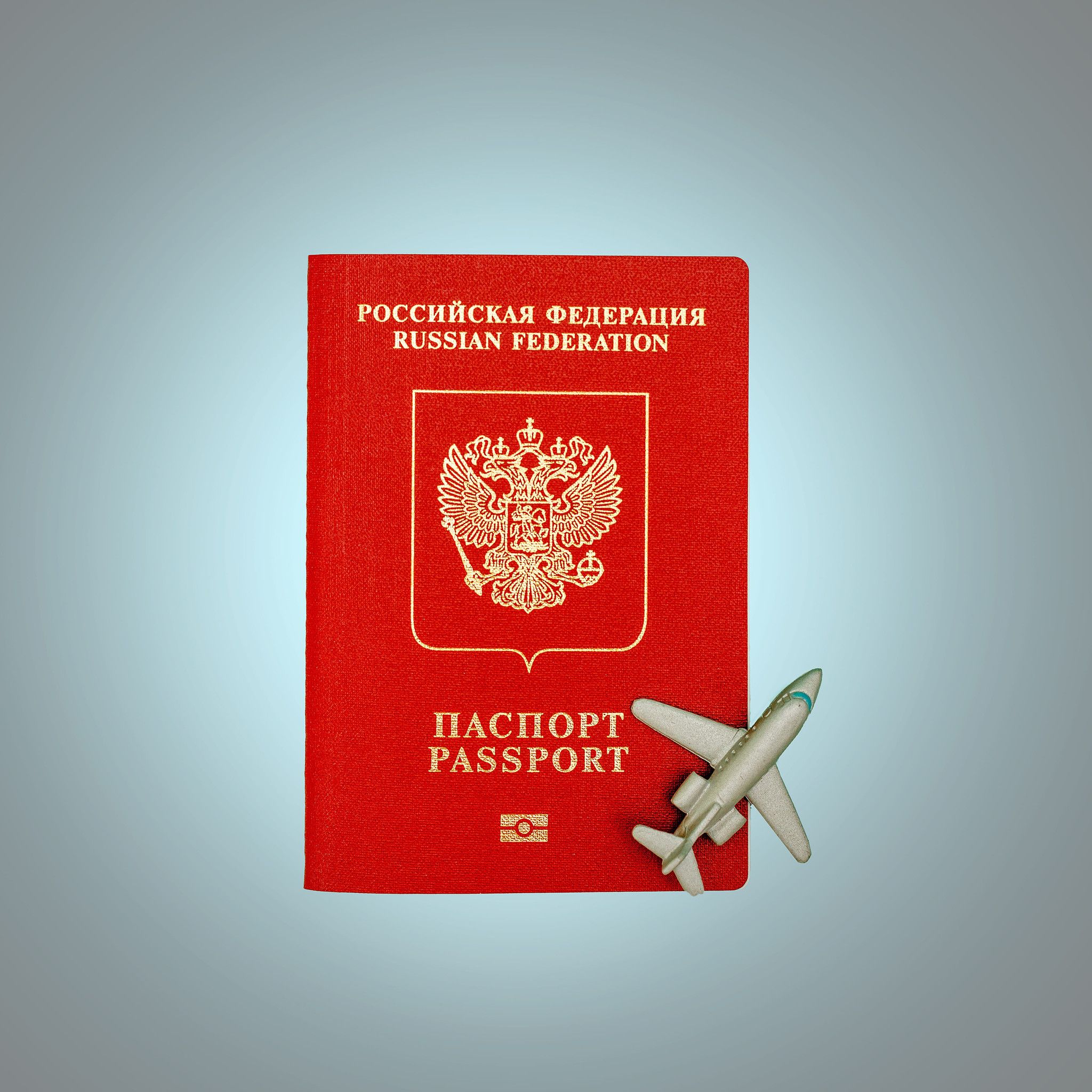 Russian Passport with a Toy Plane