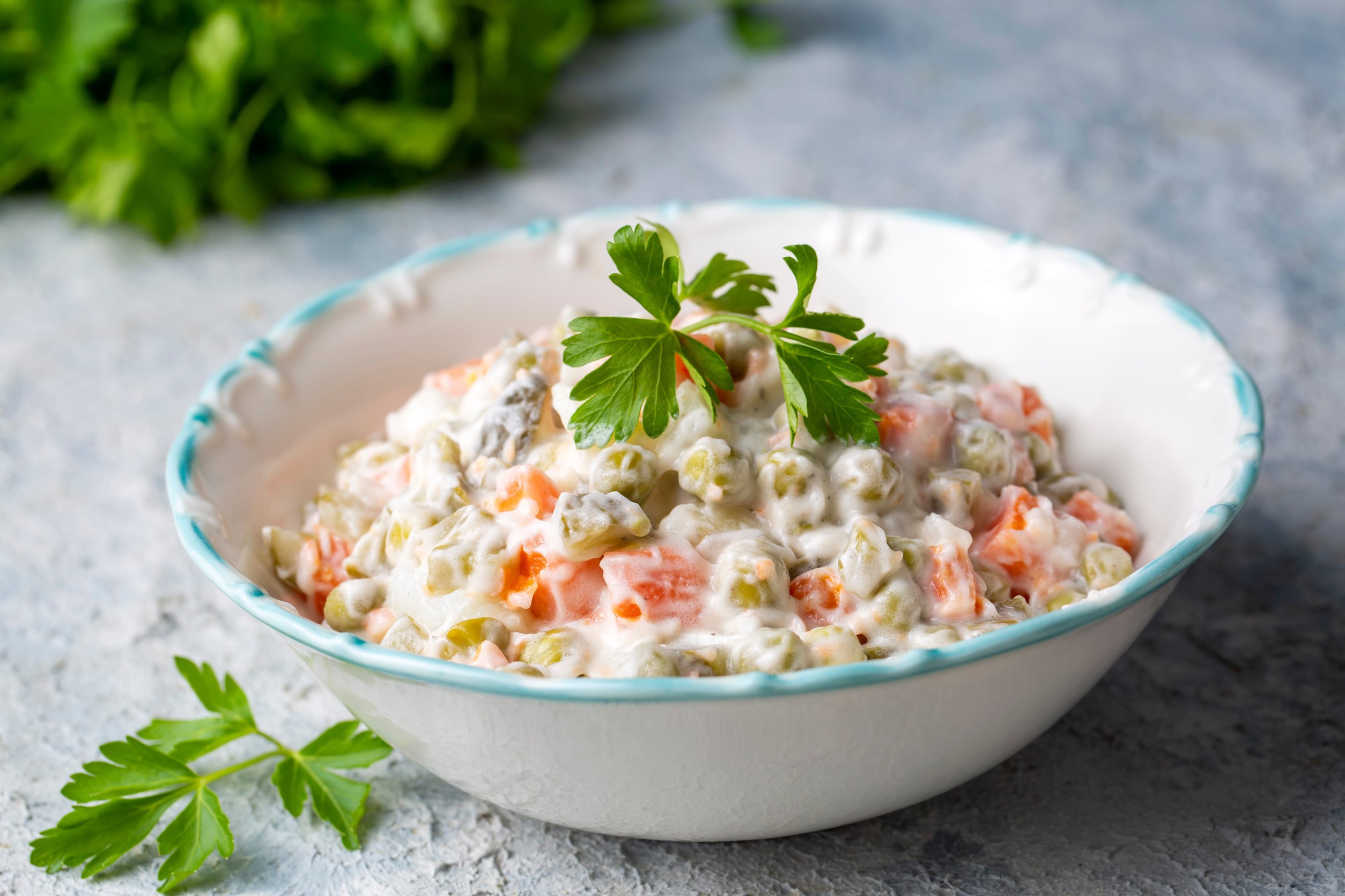 Russian Salad Olivier with mayonnaise and eggs